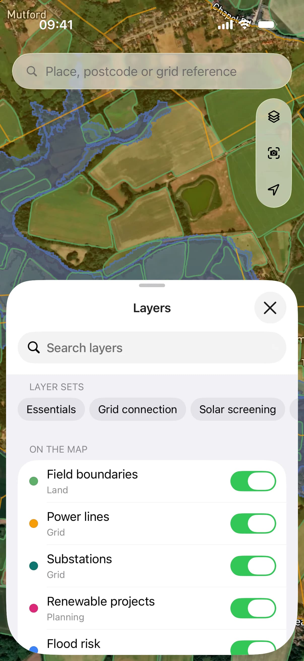 The layers sheet on iPhone, with saved layer sets and the layers on the map.